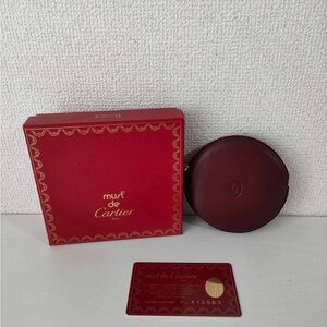 Authentic must de Cartier burgundy round coin pouch